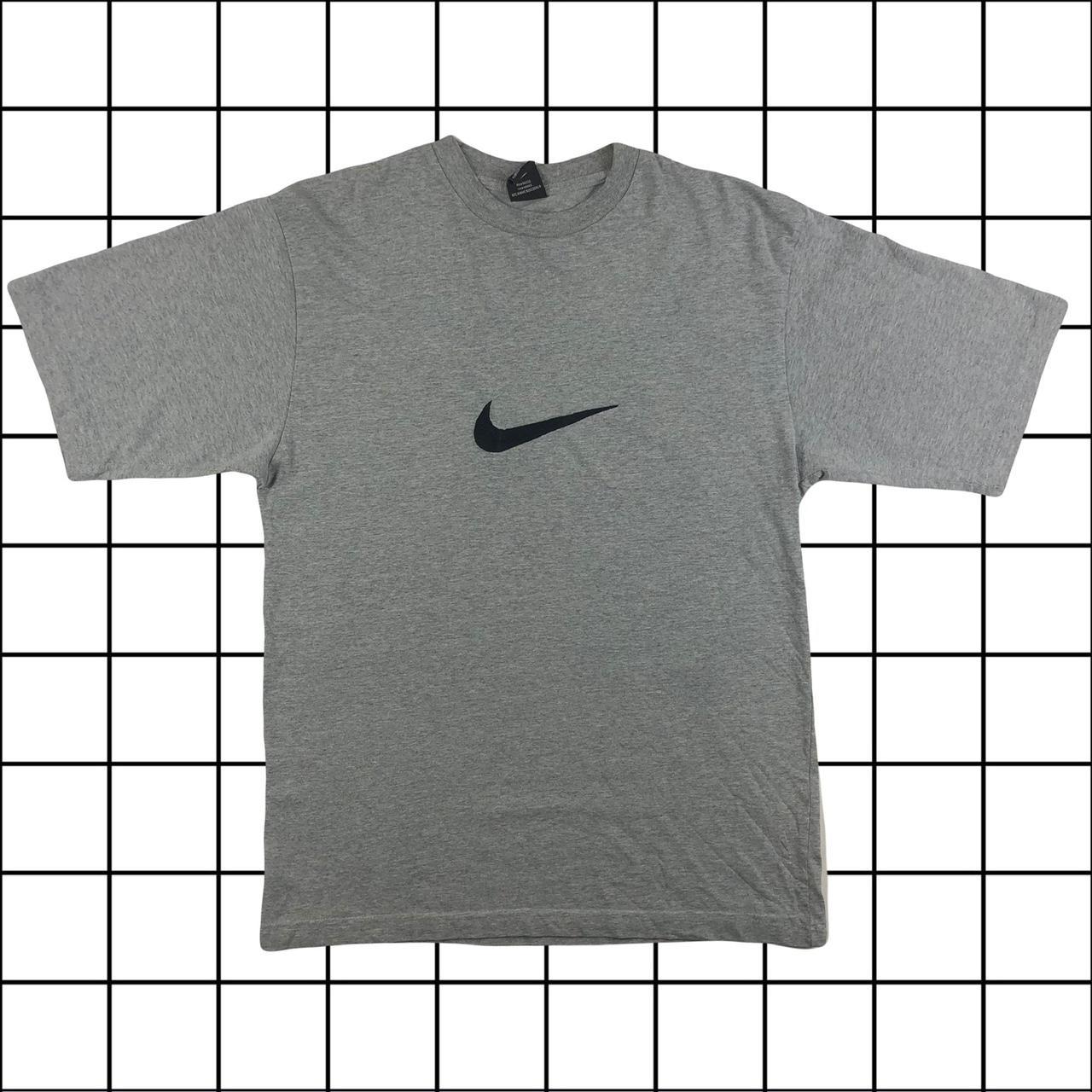 Nike t shirt tick in middle online