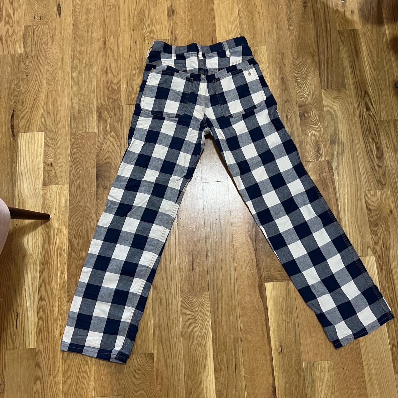 JW Anderson Women's Navy and White Trousers | Depop