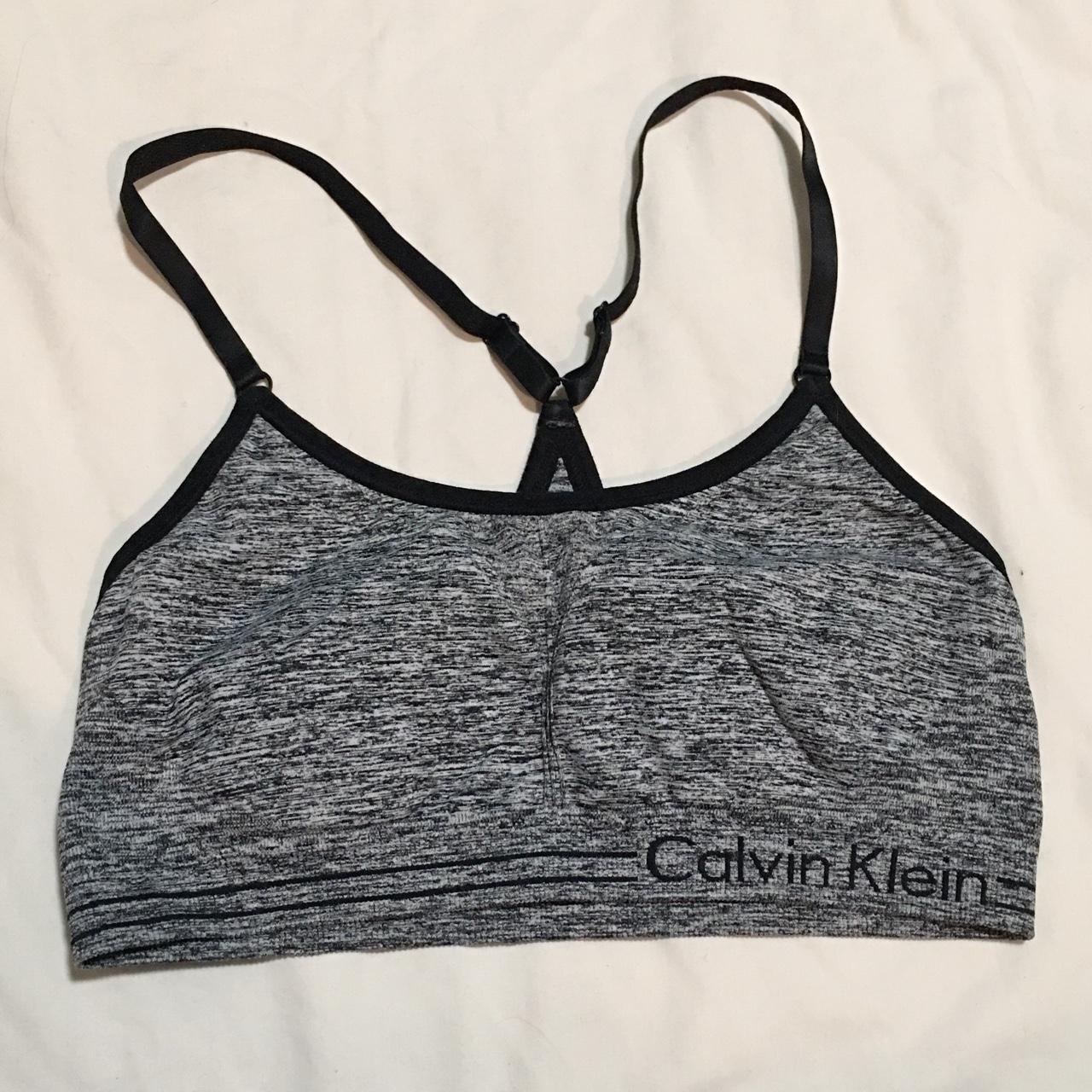 Calvin Klein sports bra no size tag, best fits - Depop