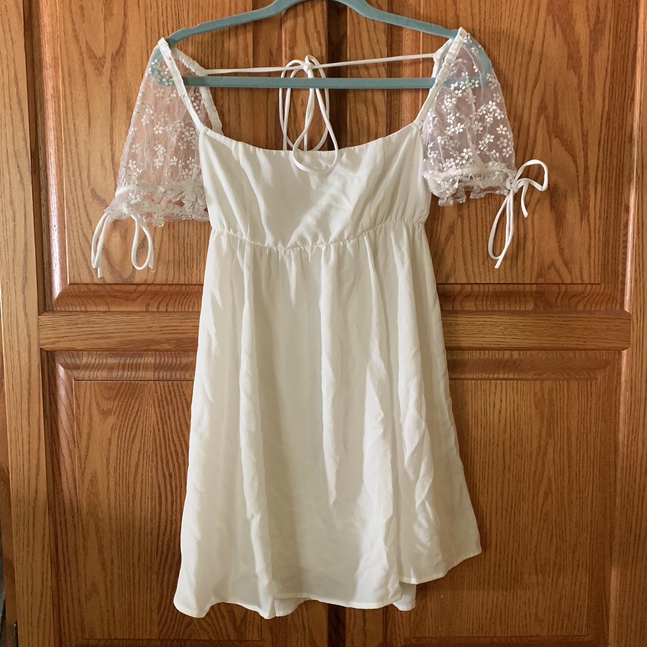 Small Lucy in the Sky Babydoll Sunflower/White Dress - Depop