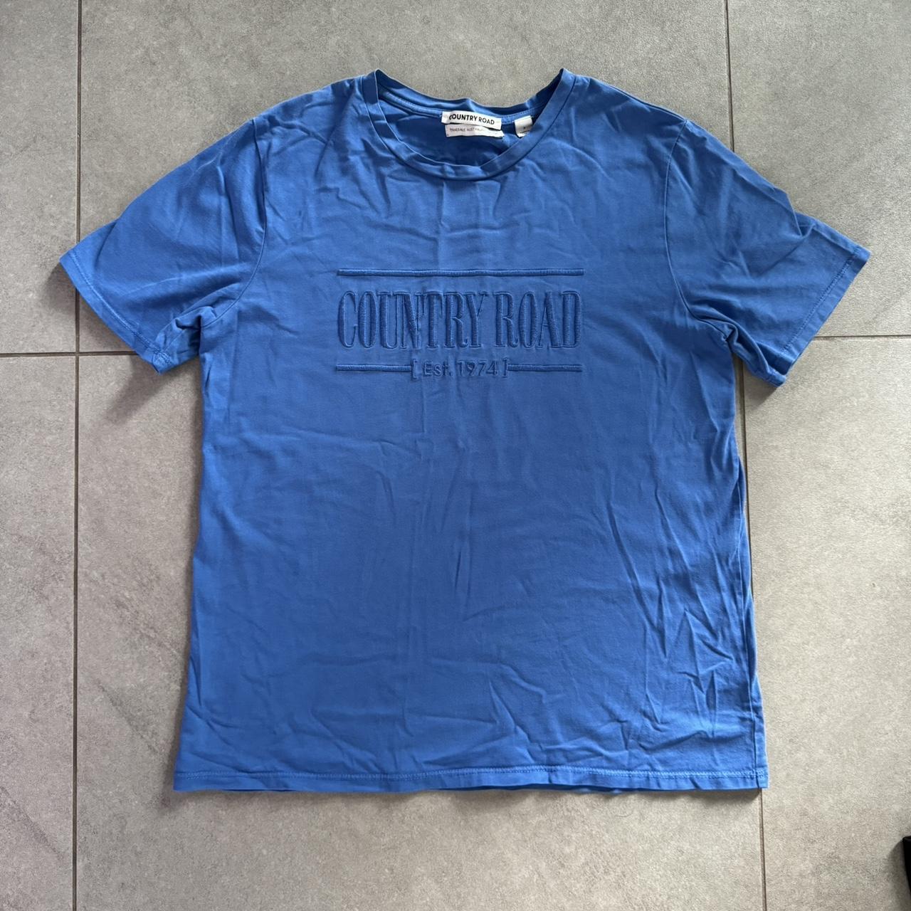 Country Road blue tee. Some wear on the logo but not... - Depop