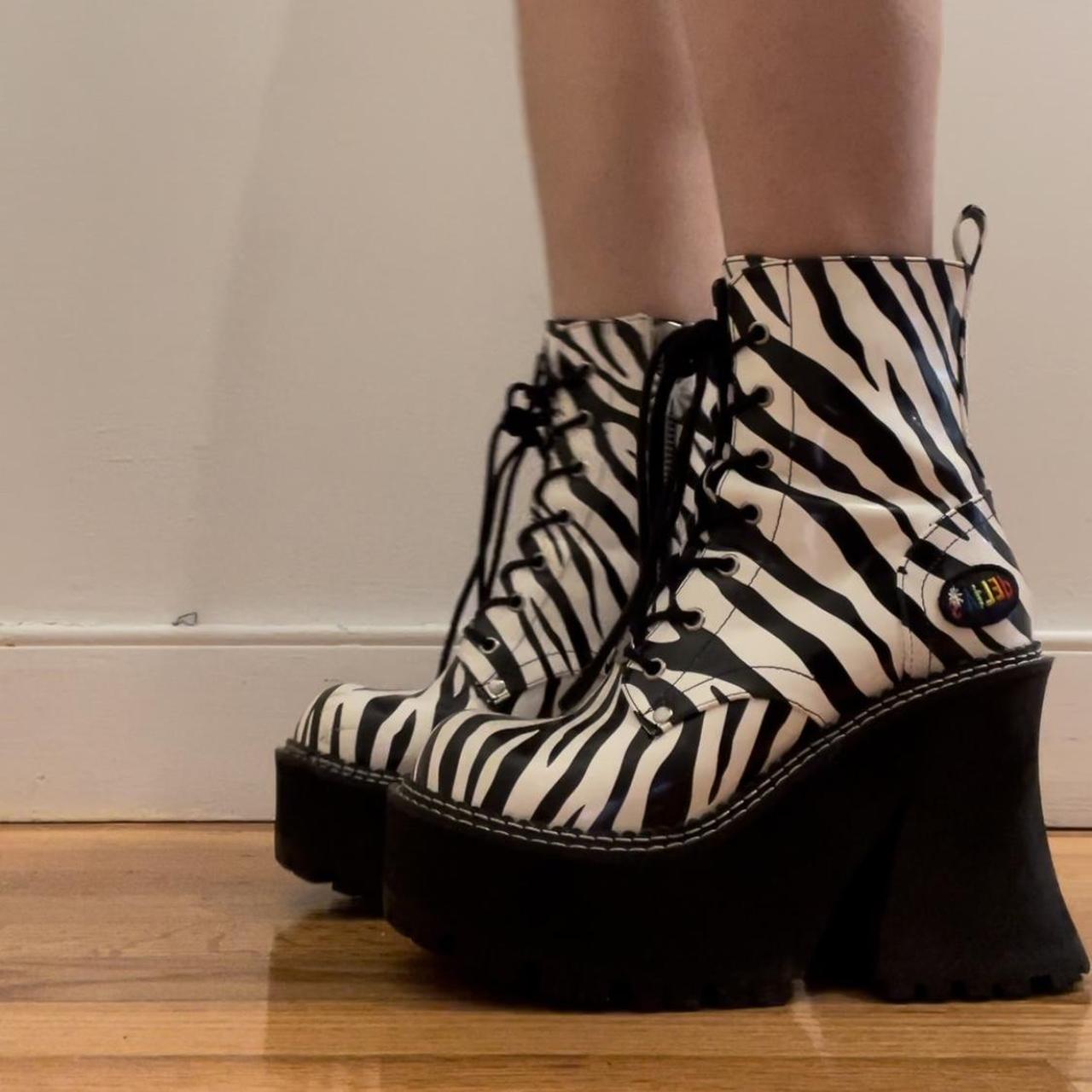 Dolls Kill Women's Black and White Boots Depop