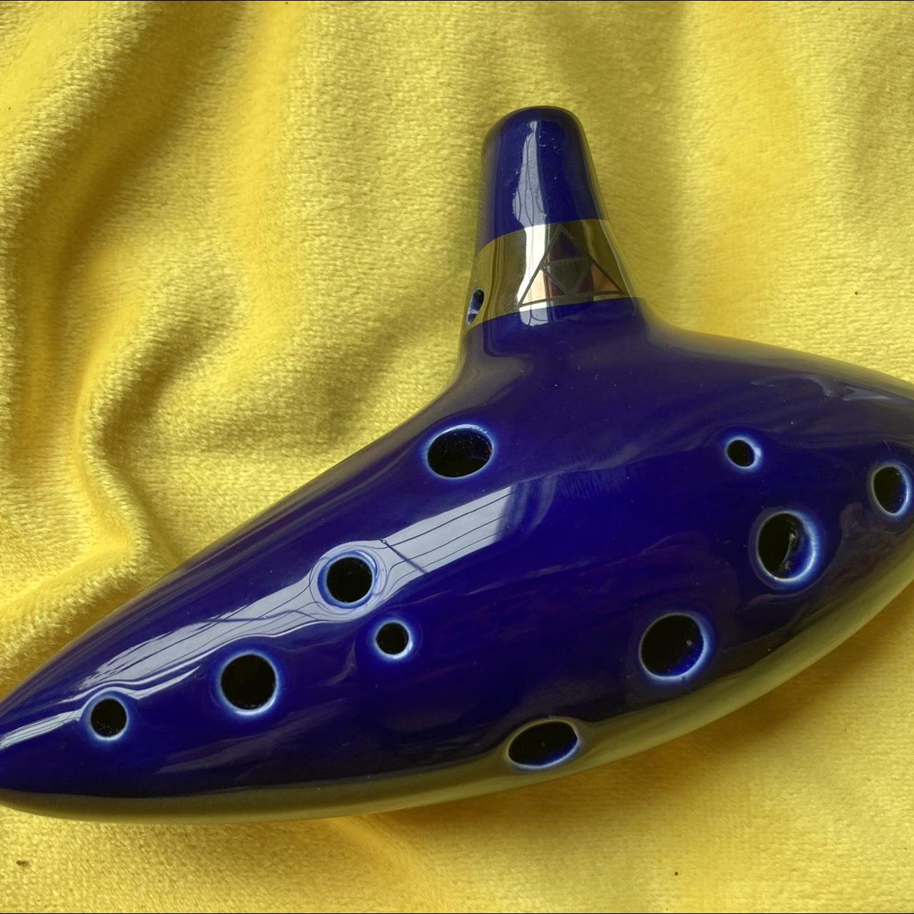 ZELDA Ocarina of Time Ocarina and stand, barely used... - Depop