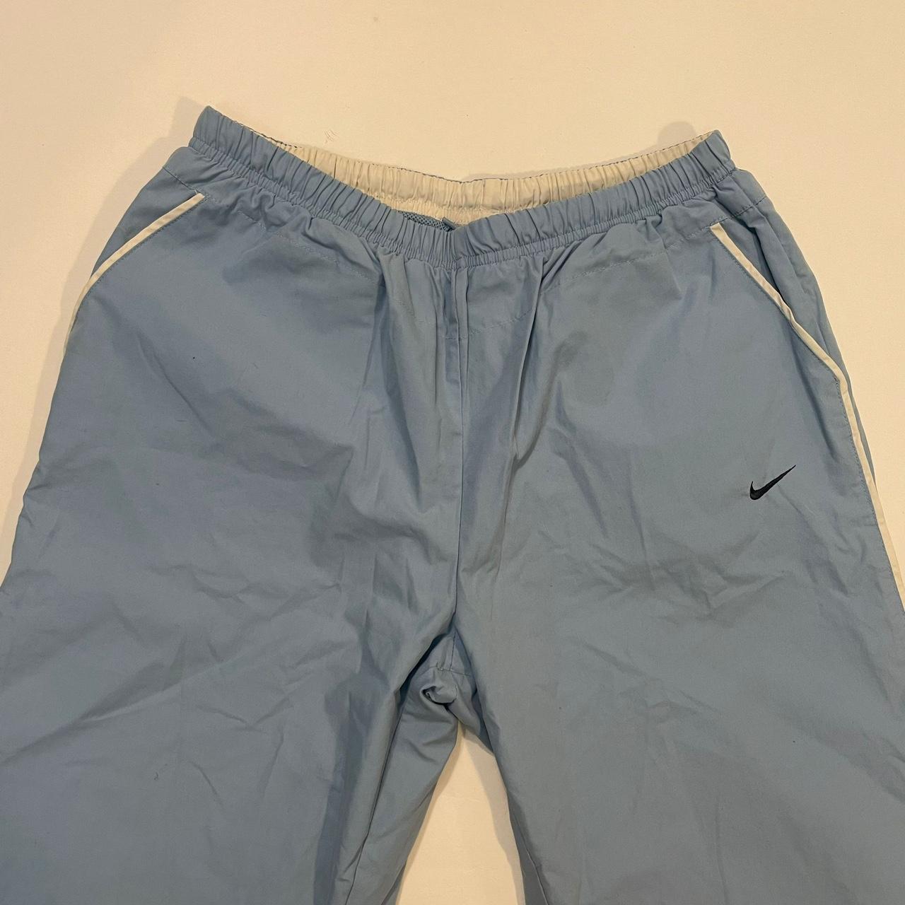 Nike blue track pants sweatpants vintage 00s... Depop