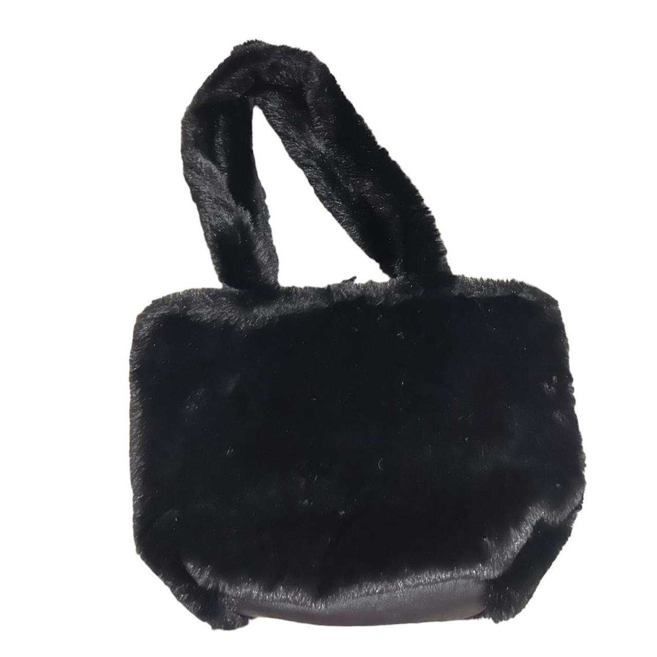 Black brandy Melville fur shoulder bag. Cute and... Depop