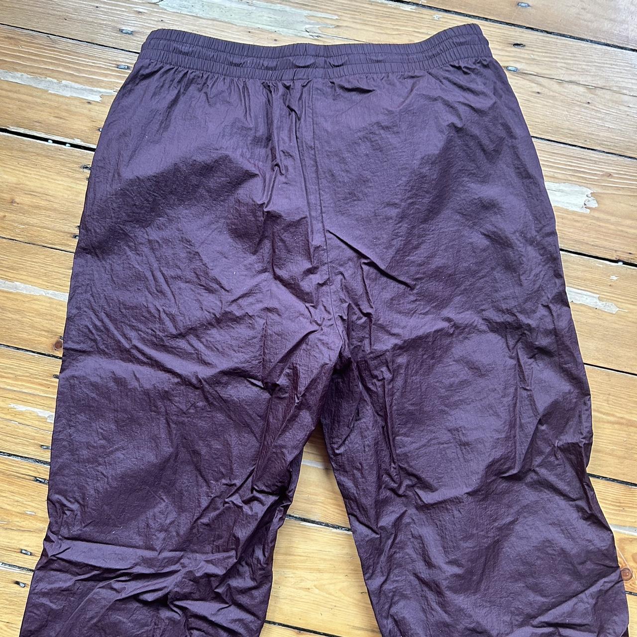Stussy purple trackpants, parachute style trousers.... - Depop