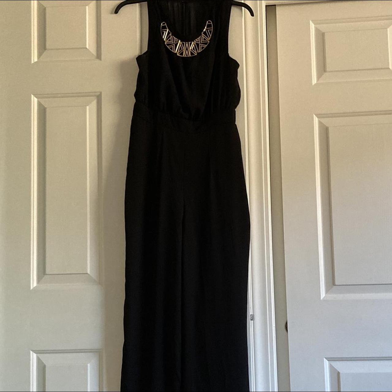 Black & gold jumpsuit size 7-8 Zipper on the back,... - Depop