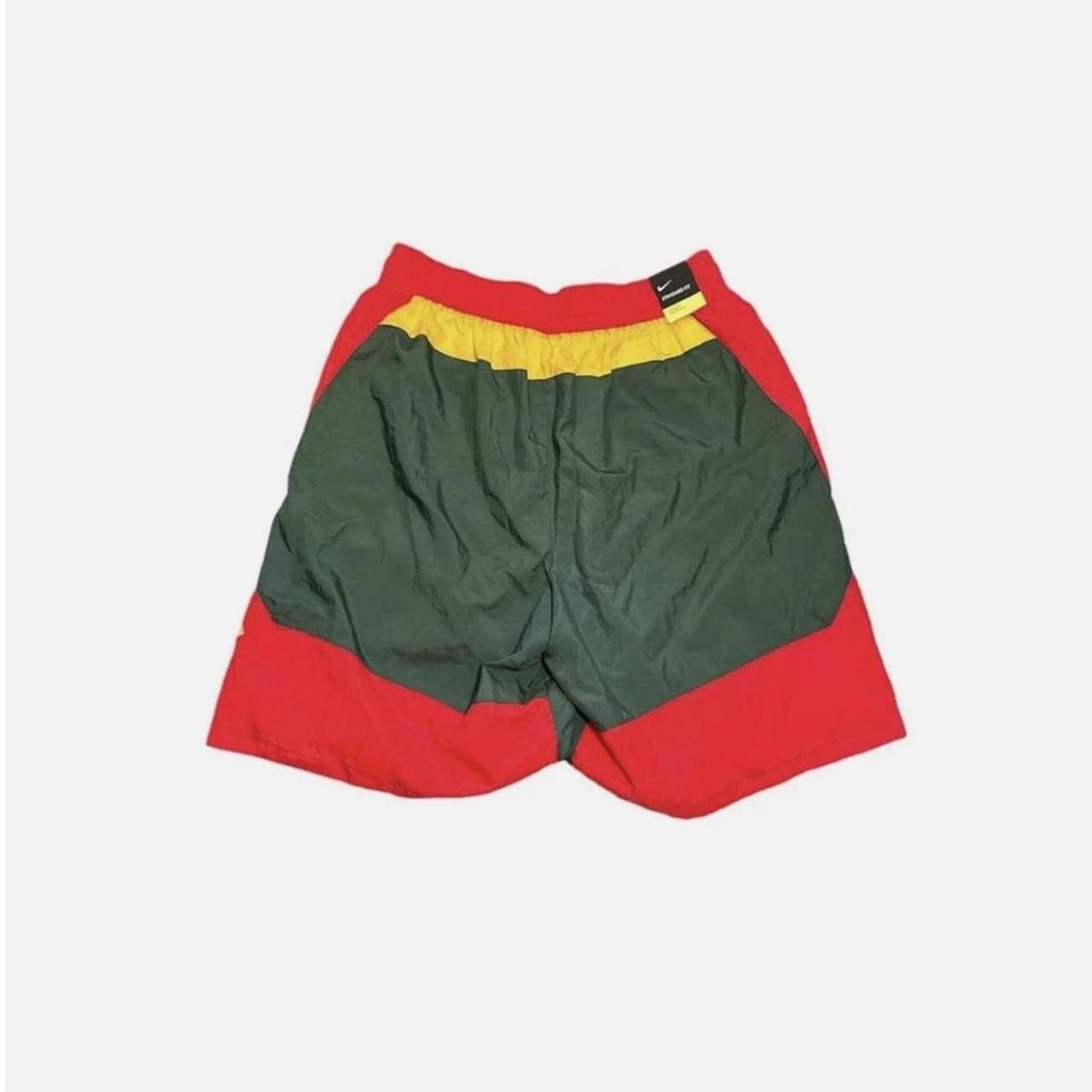 green red and yellow nike shorts