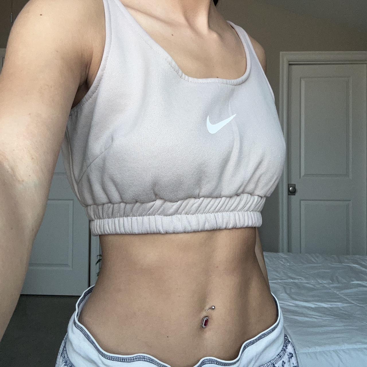 beige nike crop top