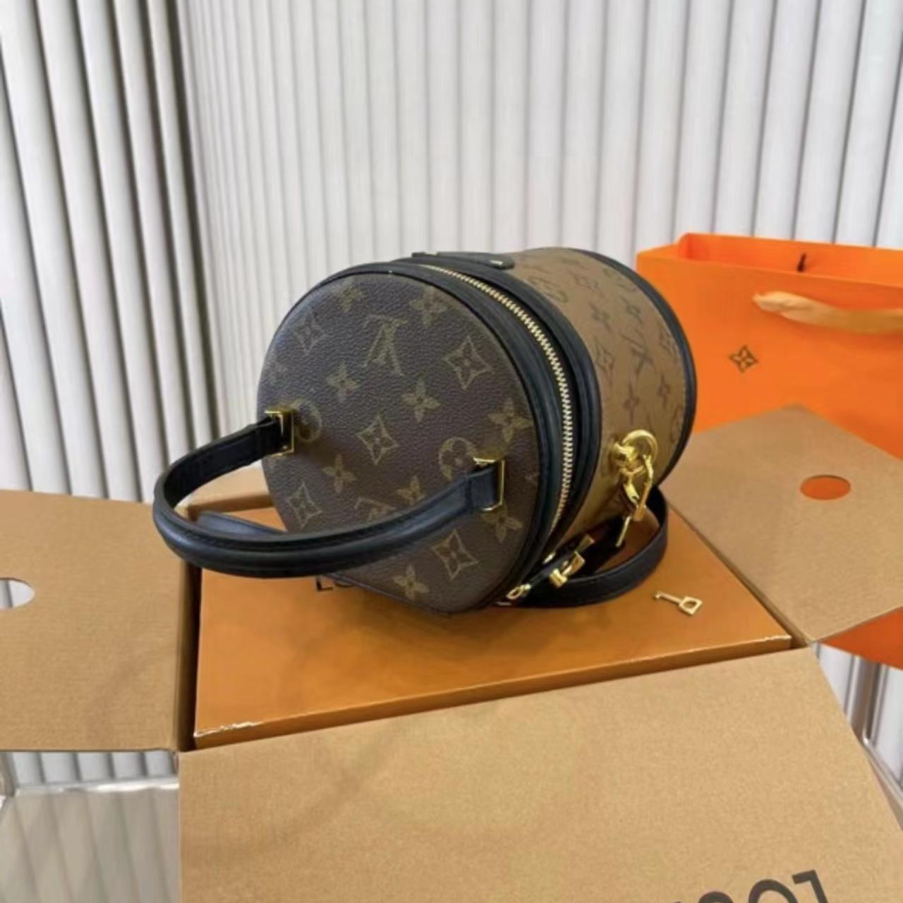 Looking for this louis vuitton unicef lockit - Depop