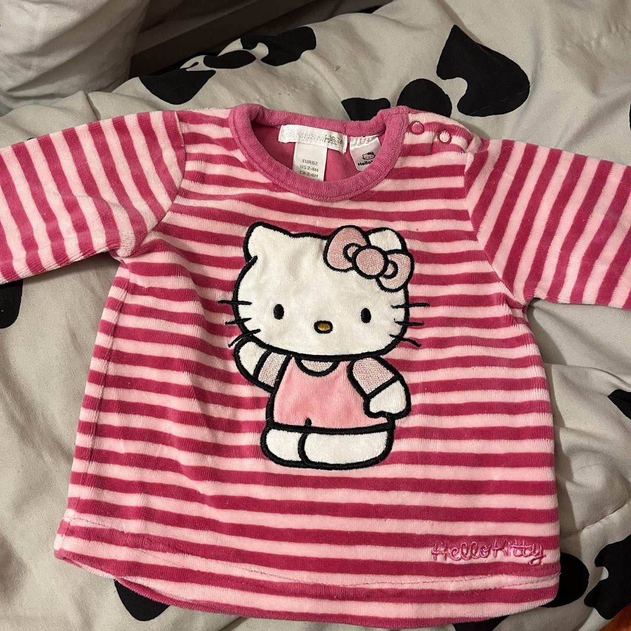 white Hello Kitty design t-shirt with four tiny - Depop