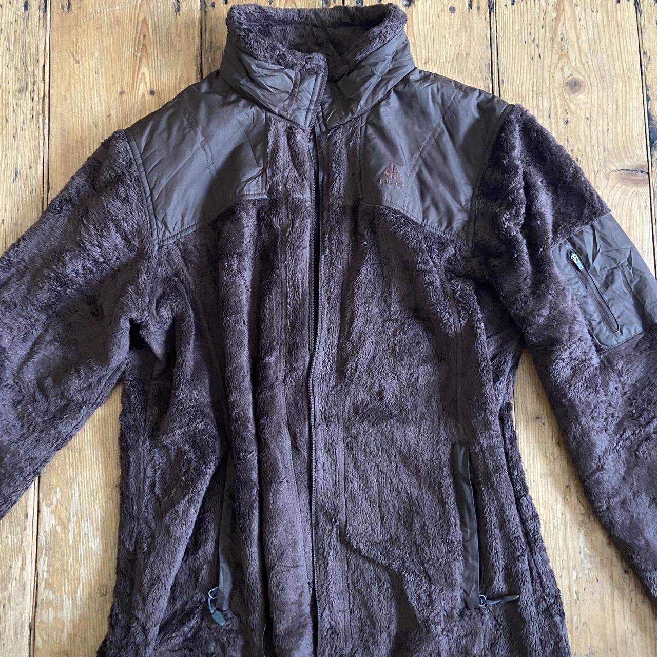 nike acg brown jacket, zip is hard to do up/seems... Depop