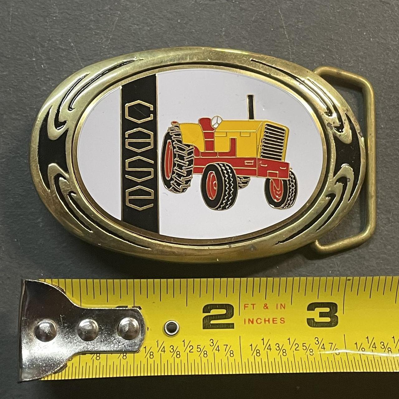 Case tractor belt clearance buckle