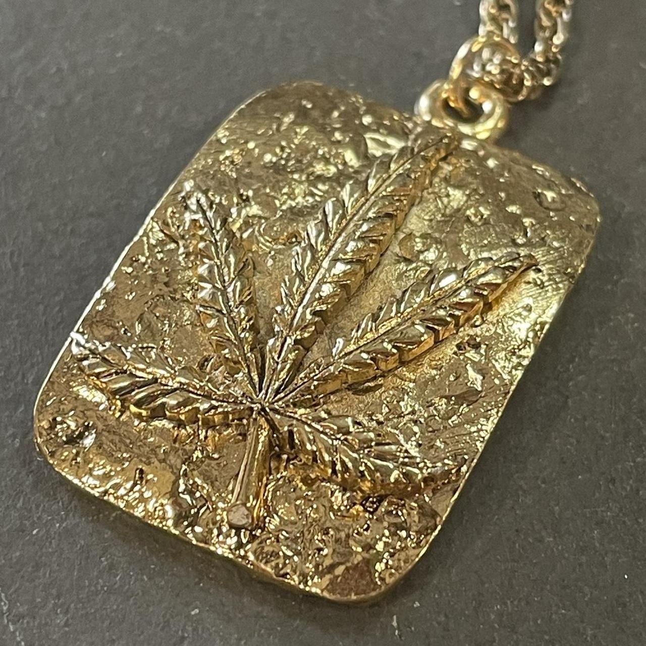 Vintage 70s pot leaf necklace. This gold tone | Depop