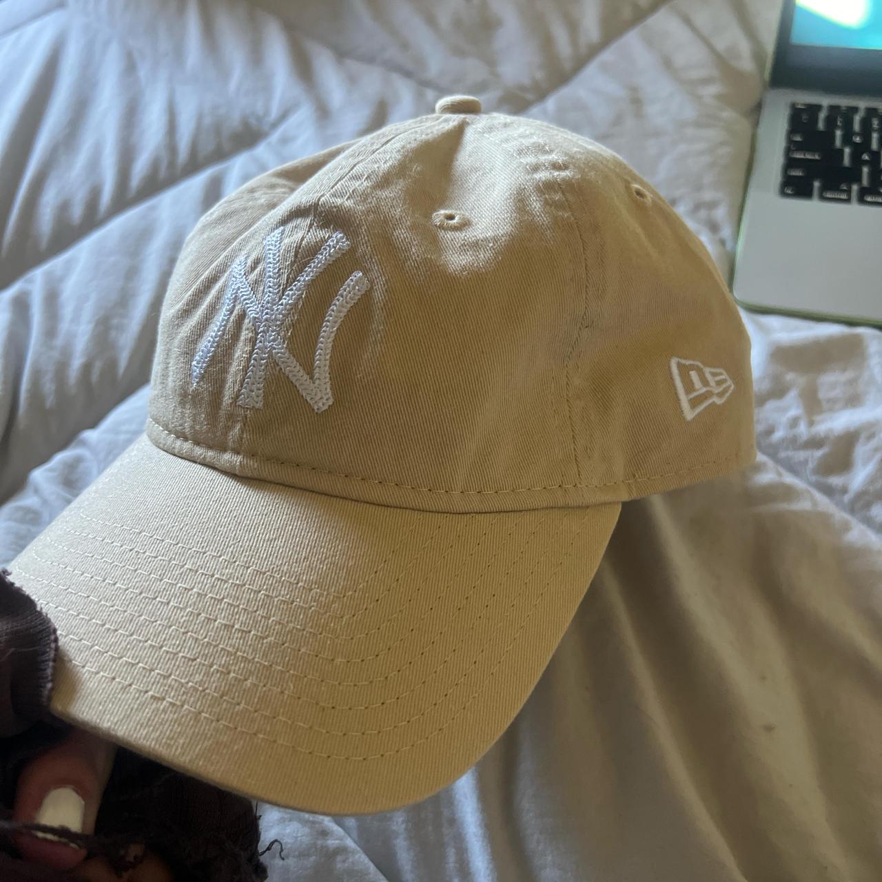 NY hat in cream. never worn. - Depop