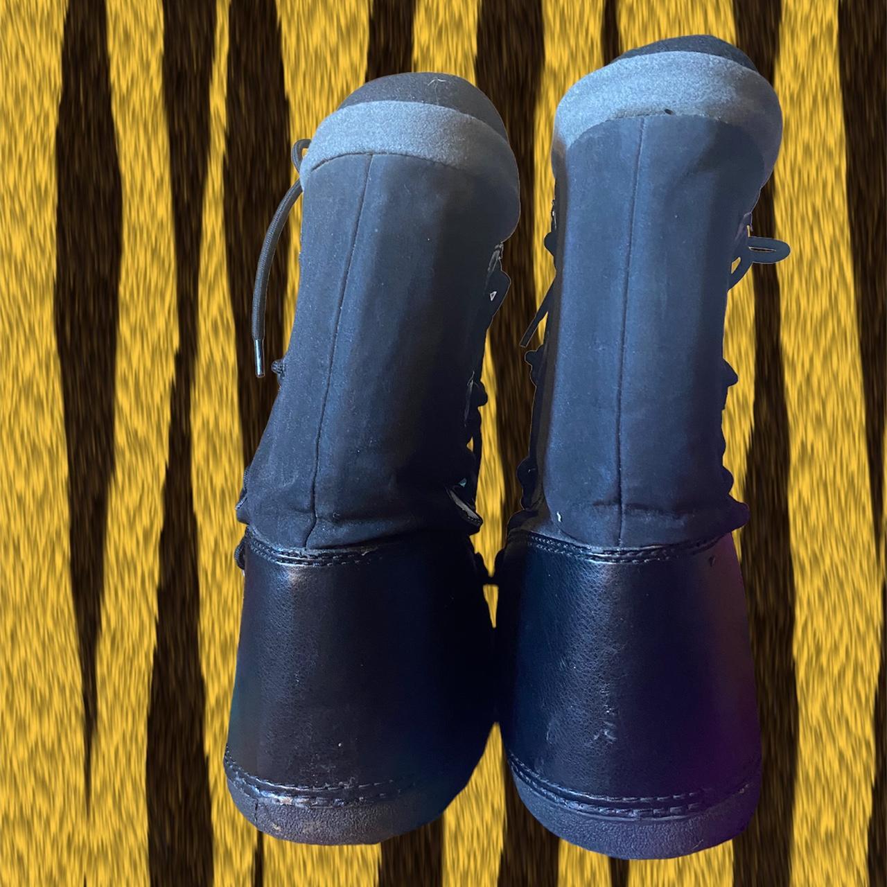 vintage black ski snow boots slight tear at the... Depop