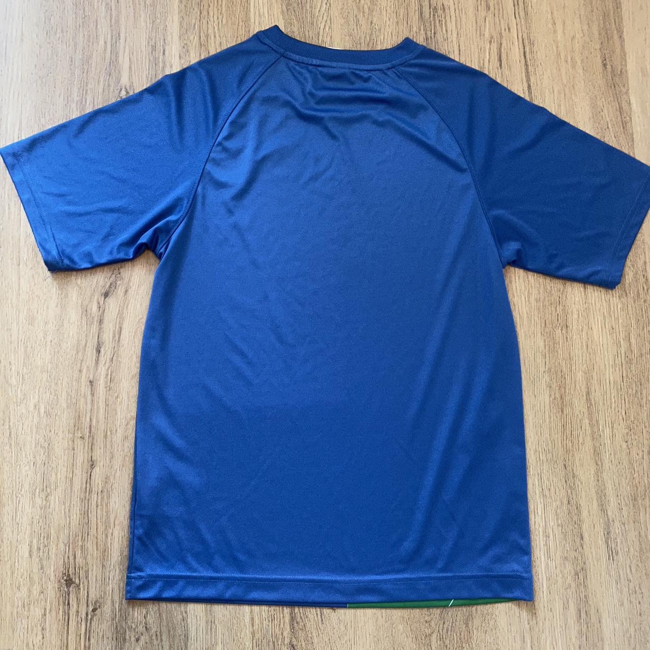 Royal blue and orange nike outlet shirt