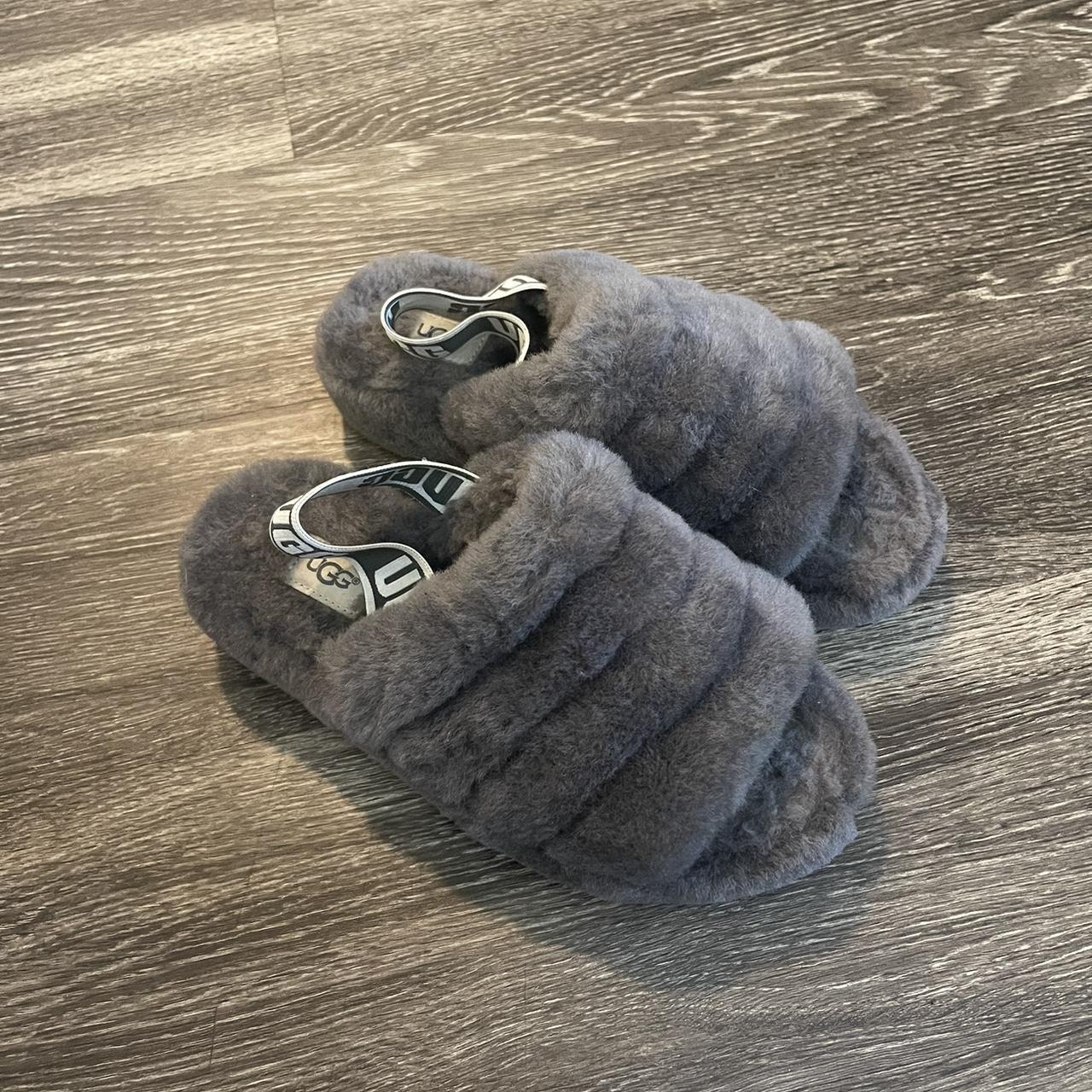 Grey women s furry ugg slippers. Slippers are in