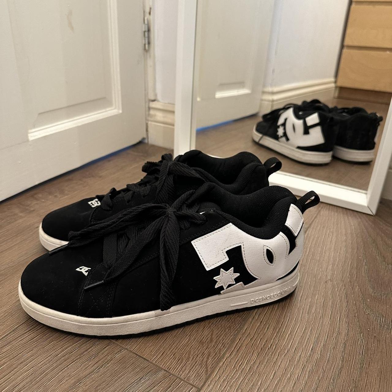 white and black dc shoes