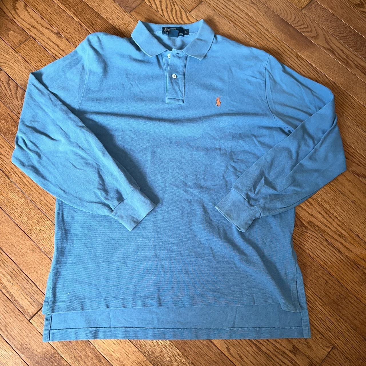 Blue polo shirt with orange outlet horse