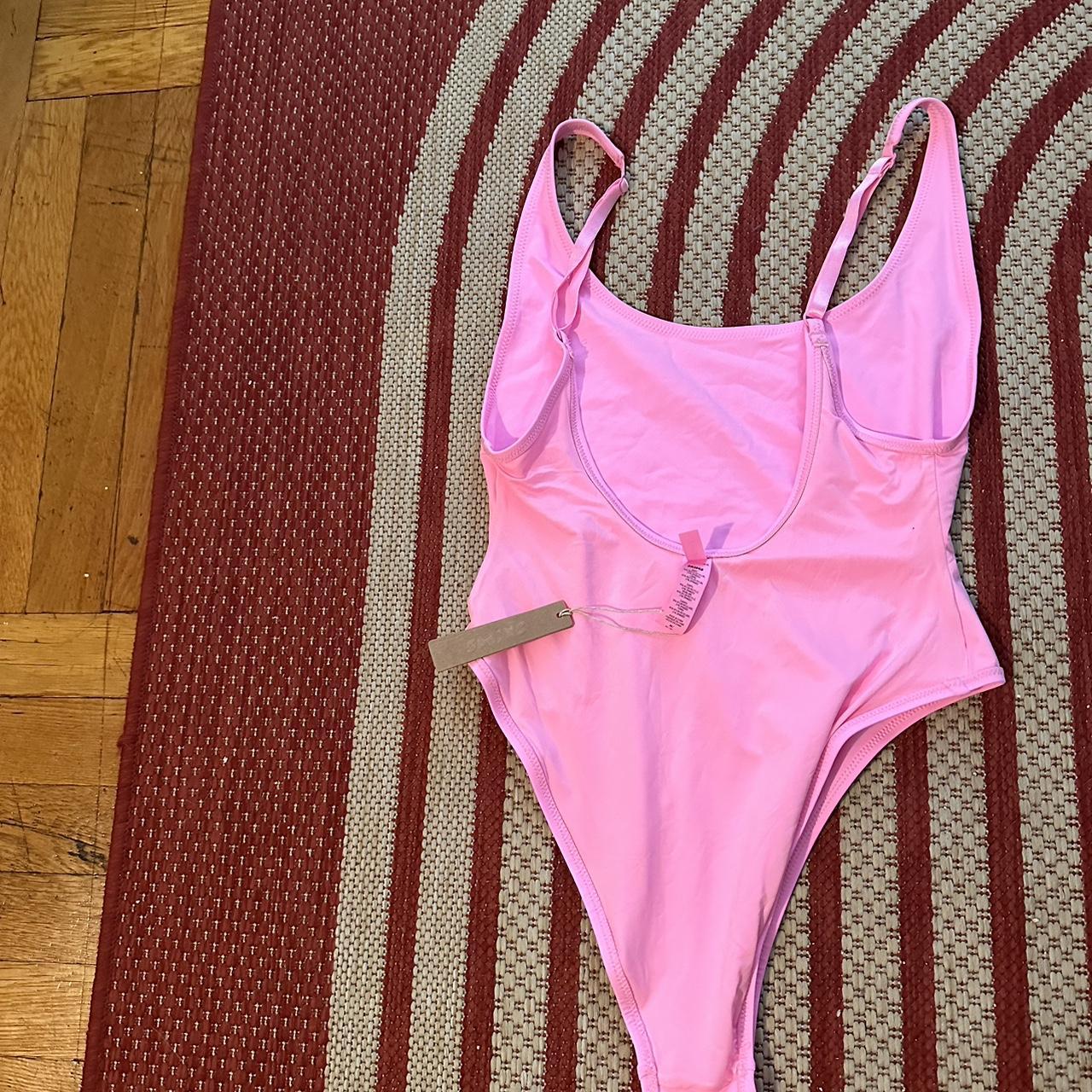 SKIMS -Scoop neck one piece -color light pink... - Depop