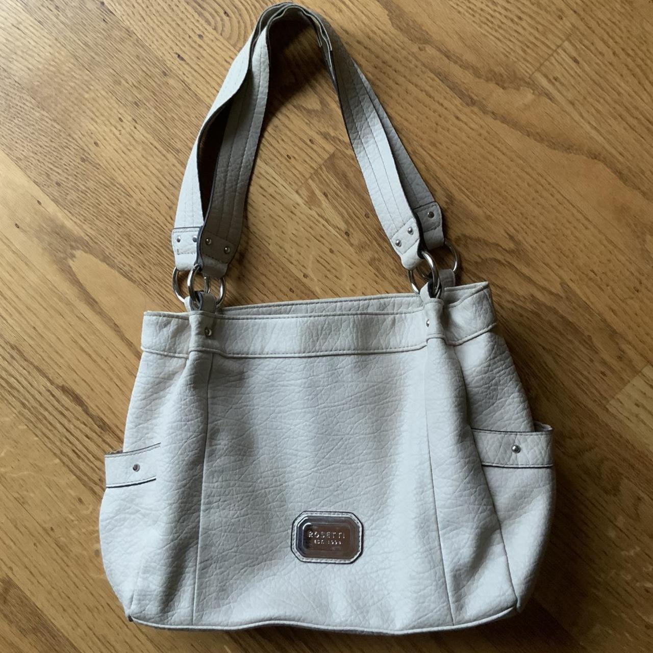 Rosetti Handbag nice beige color still in very