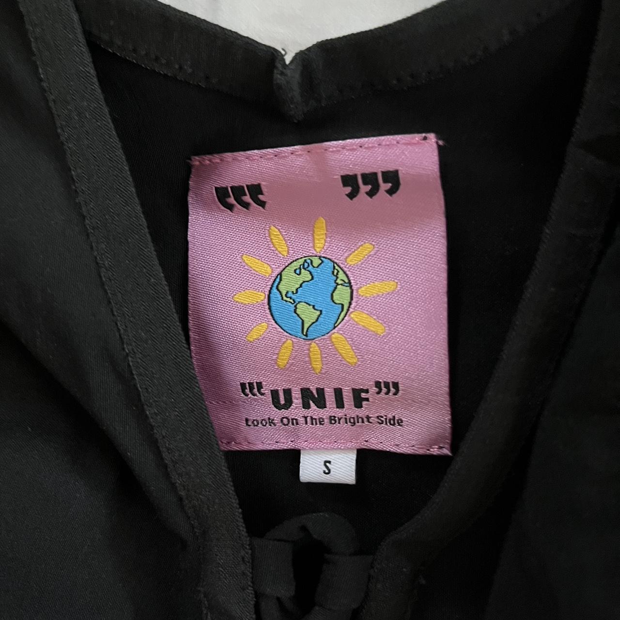 Unif black crop top with a lace up detailing in... Depop