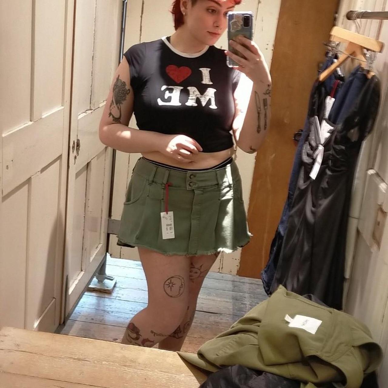 Urban Outfitters green mini skirt in size XL, new... - Depop