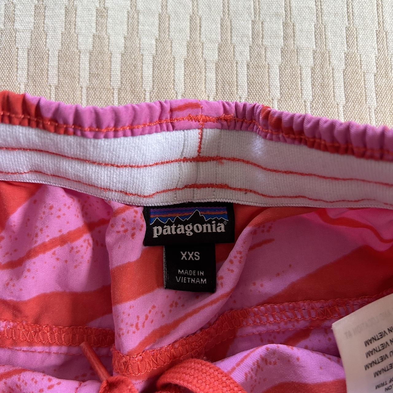 Pink and Orange floral Women’s Patagonia shorts.... - Depop