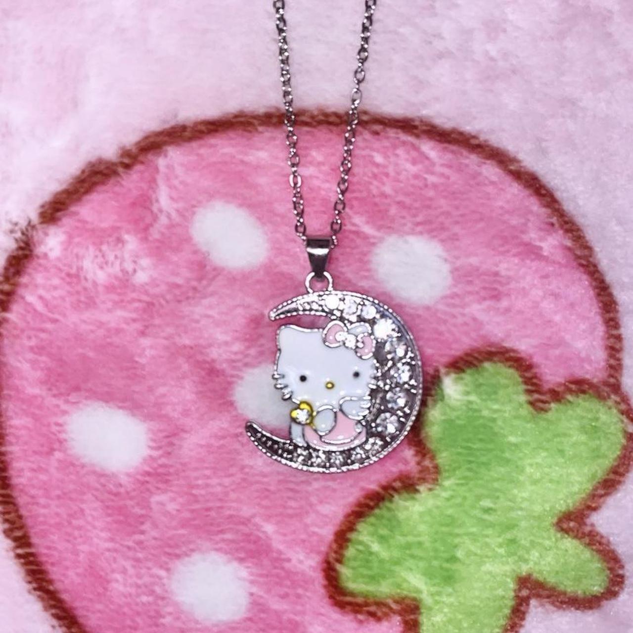 hello kitty moon necklace... - Depop