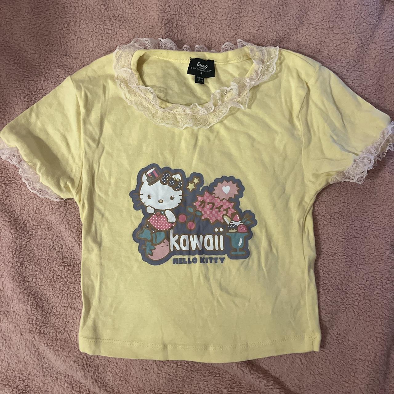 pastel yellow hello kitty tee with frilled... - Depop