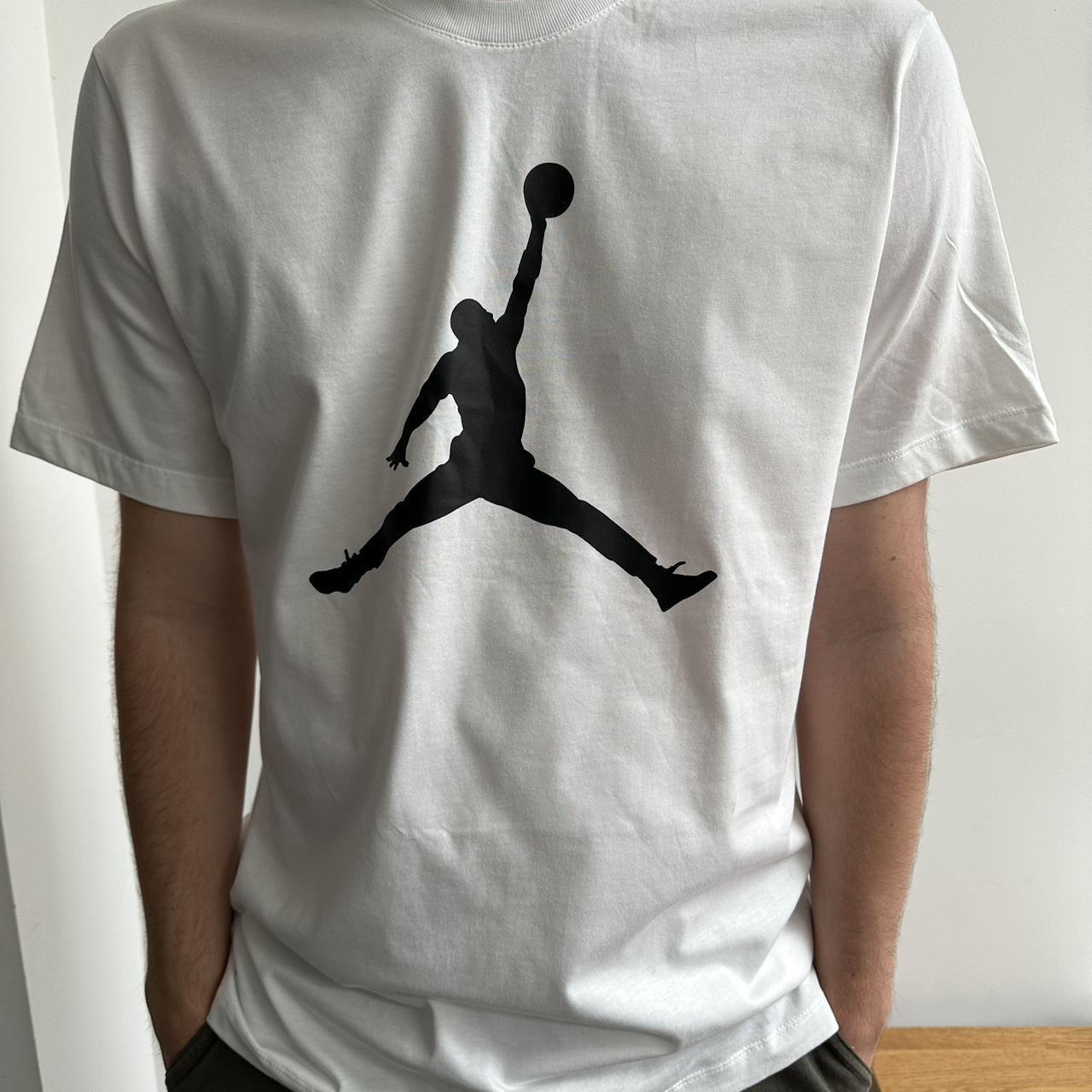 Large white Jordan T-shirt. Unworn still with tag... - Depop