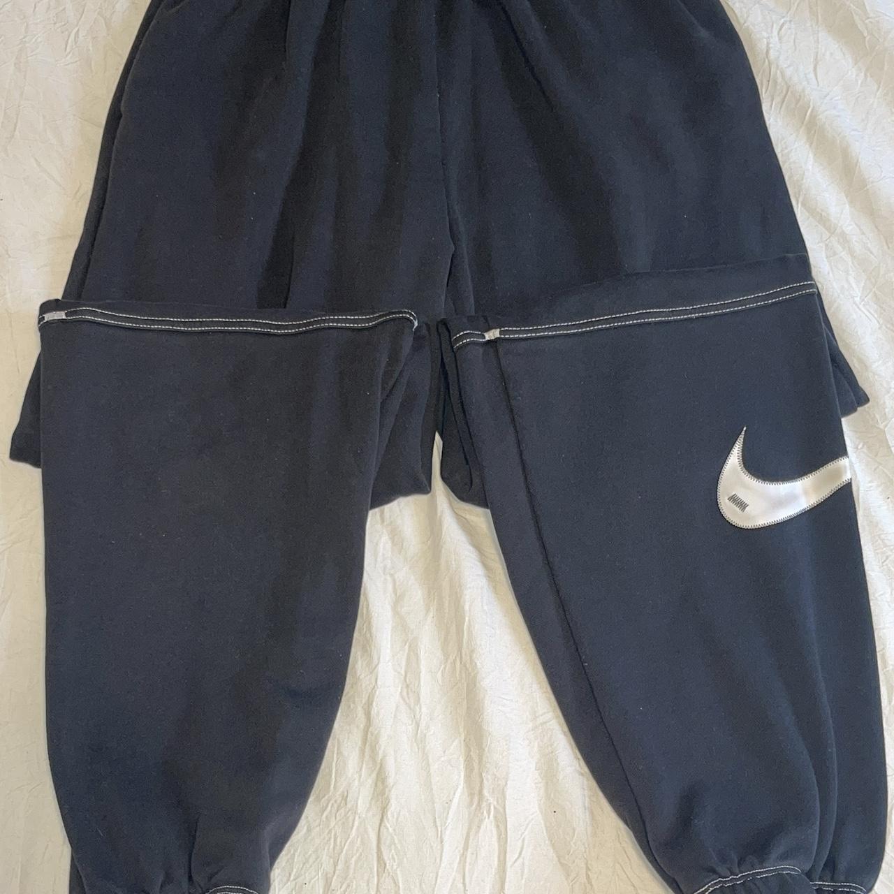 nike swoosh joggers black and white