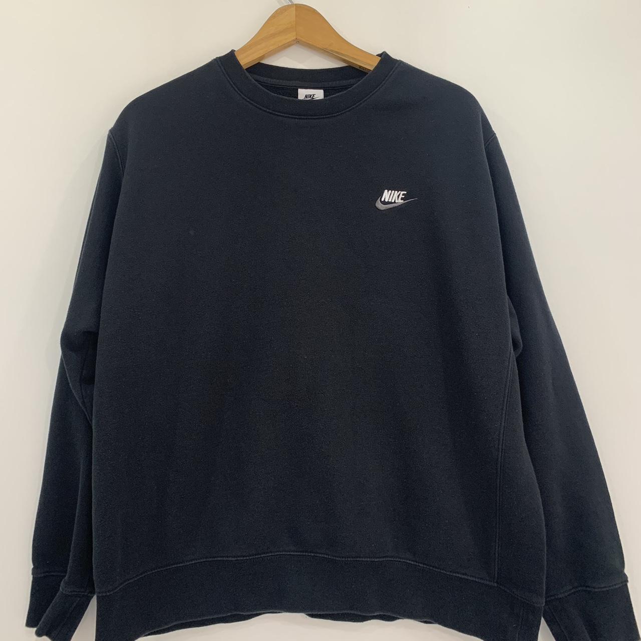 black nike sweatshirt with red tick