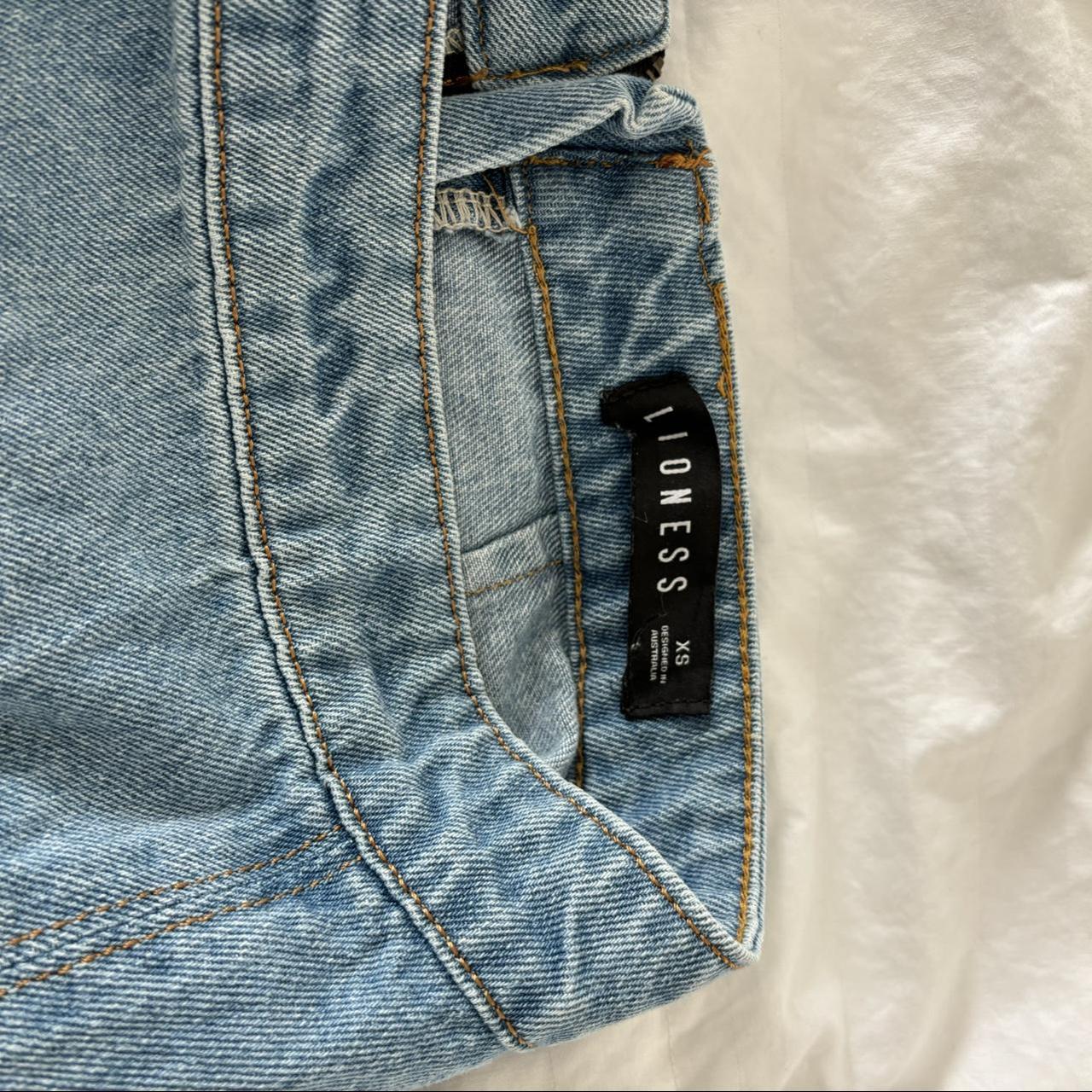 princess polly lioness denim skirt with slit flaw is... - Depop