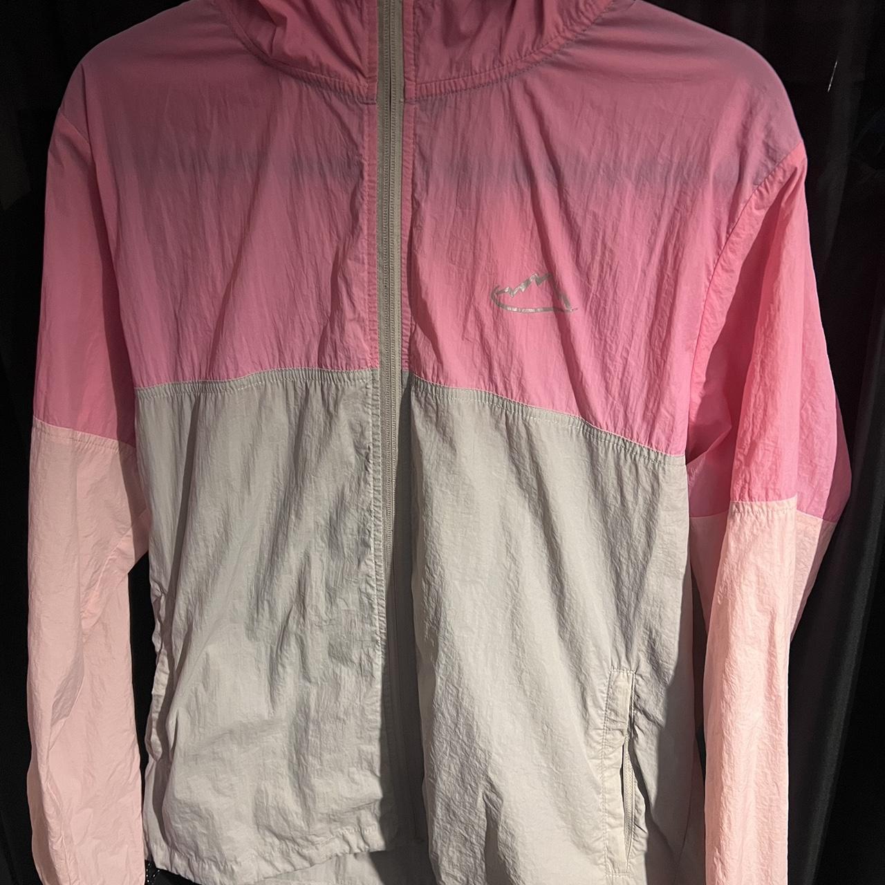Do any of y'all own t he pack it down jacket (preferably in pink mist)?  I've been debating between this and the another mile jacket 🙈 I also have  no idea what