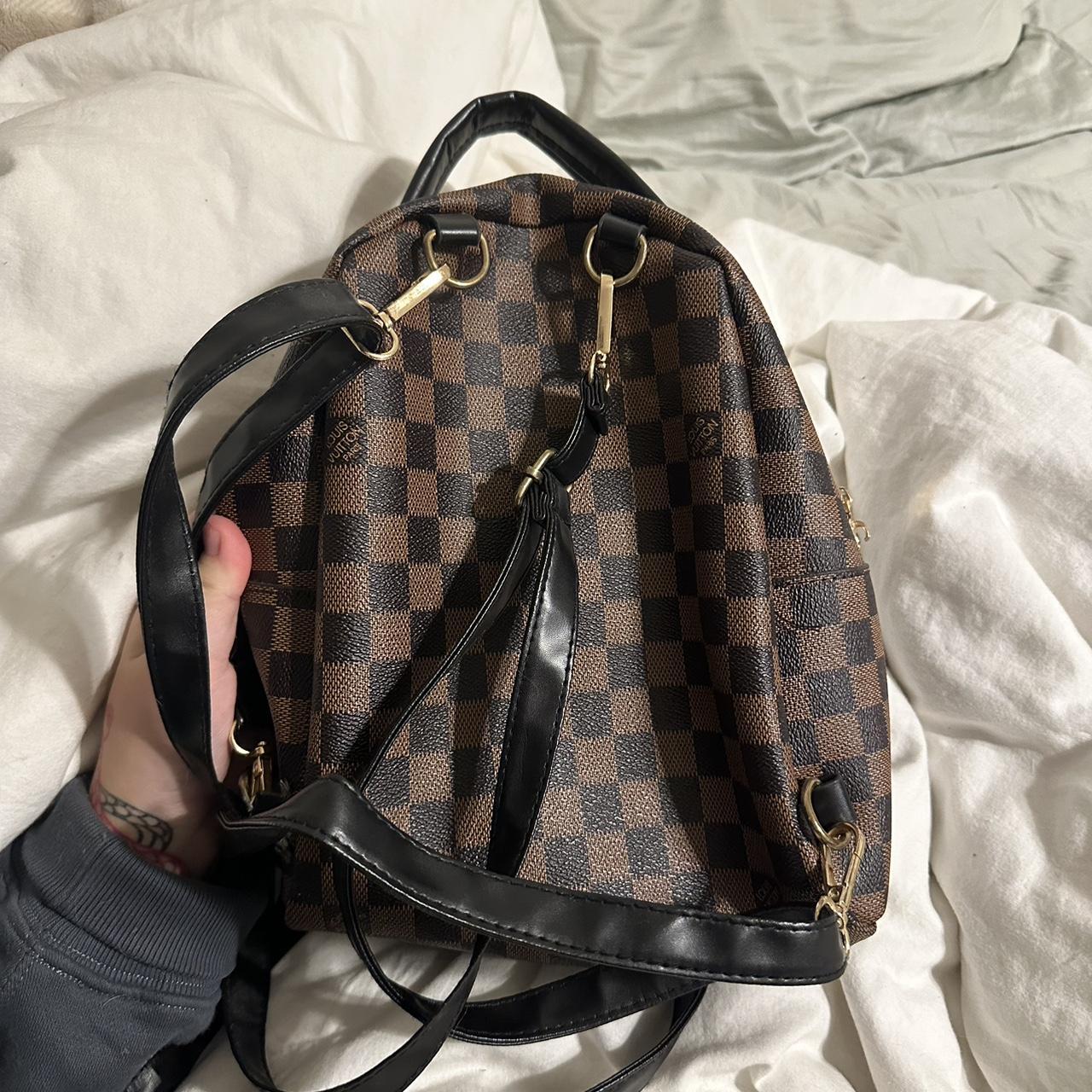 LV mini backpack Strap is ripped and zipper in - Depop