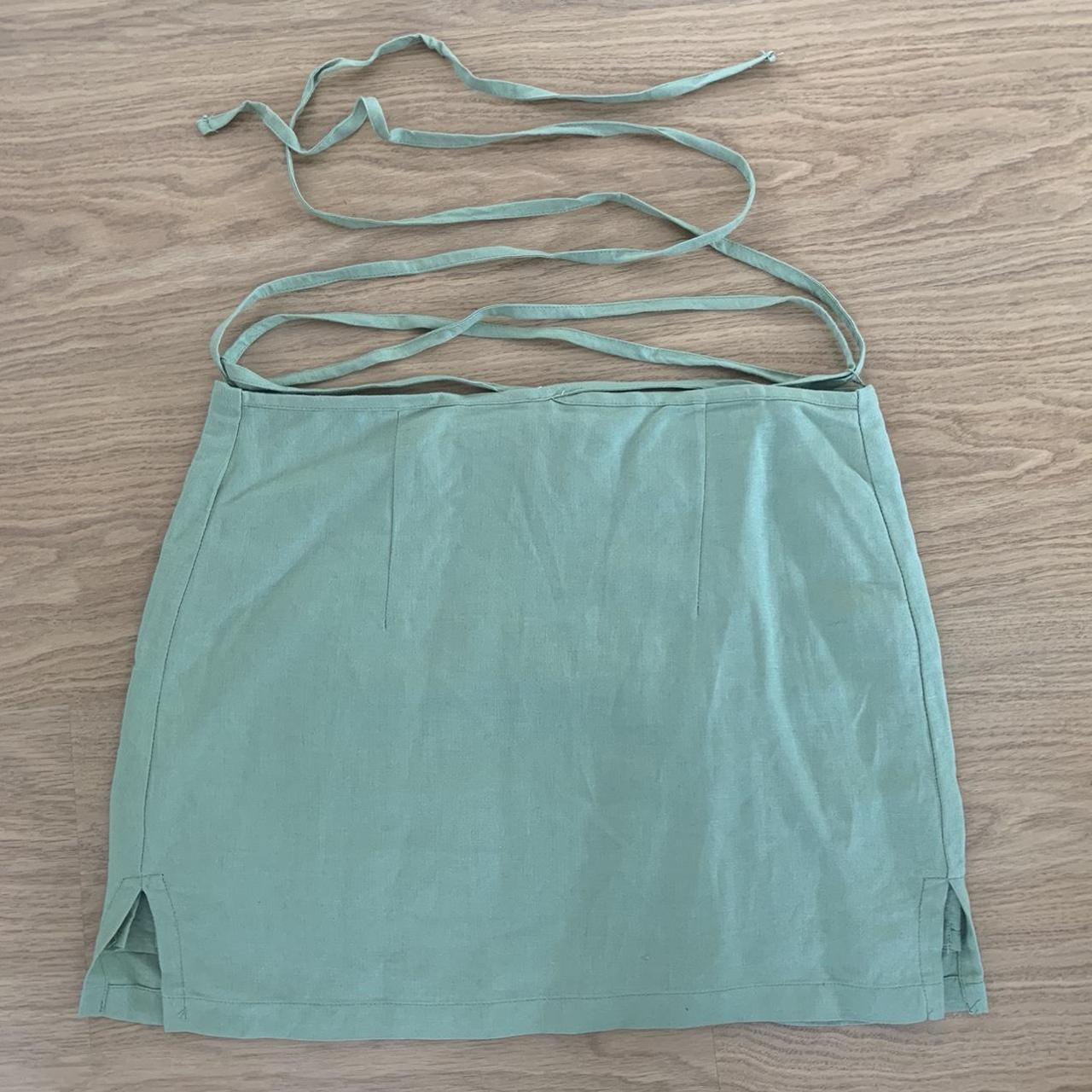 Bershka green mini skirt with straps around... Depop