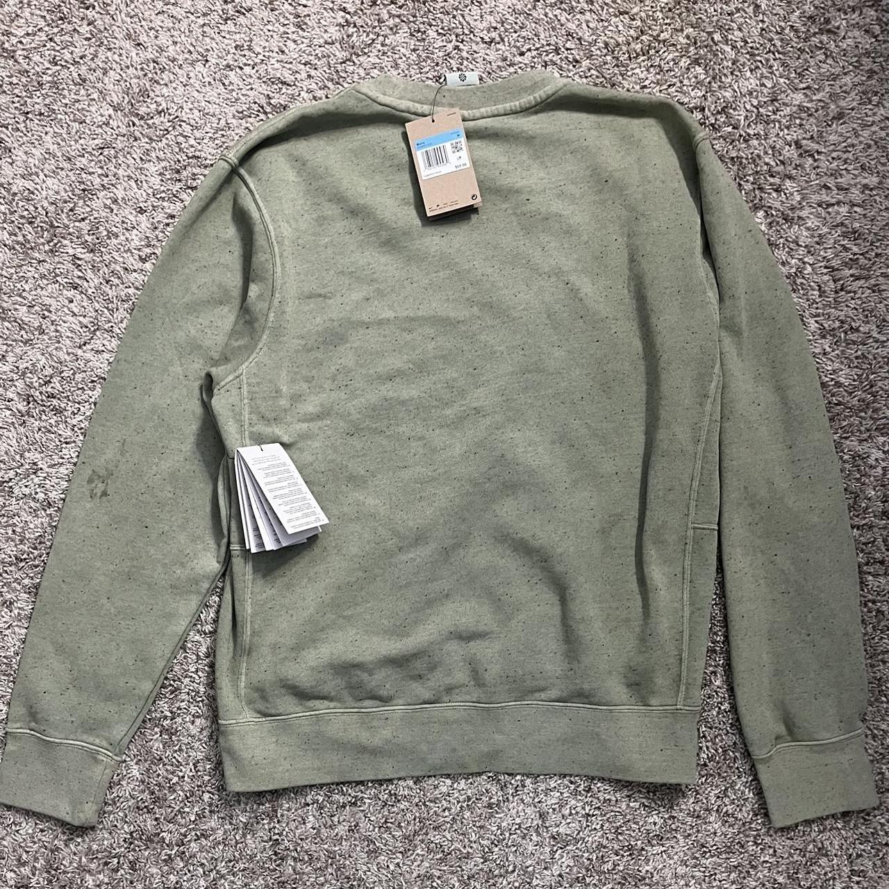 sage green nike shirt