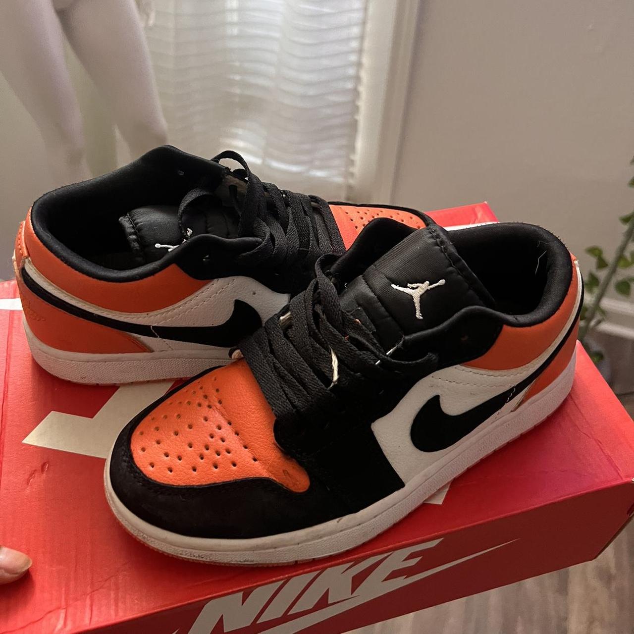 new orange and black jordans