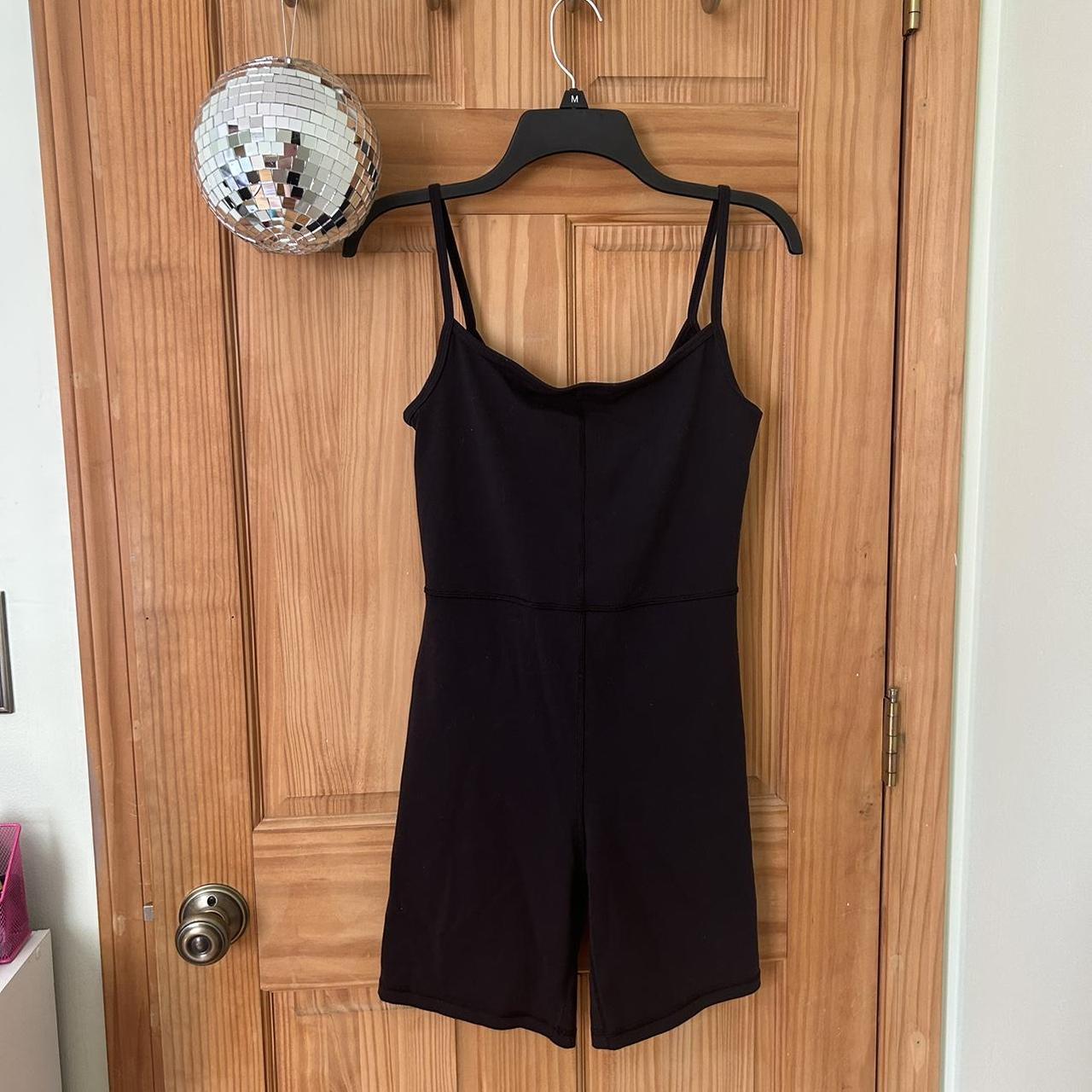 Black Babaton by Aritzia 7” divinity romper in a... - Depop