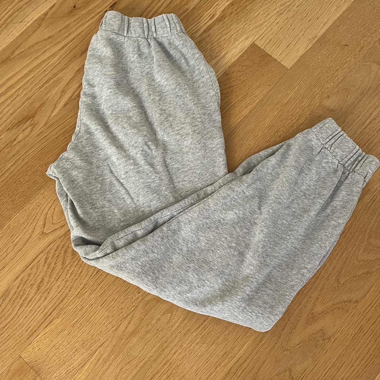 Brandy Melville grey sweatpants. Small hole on the