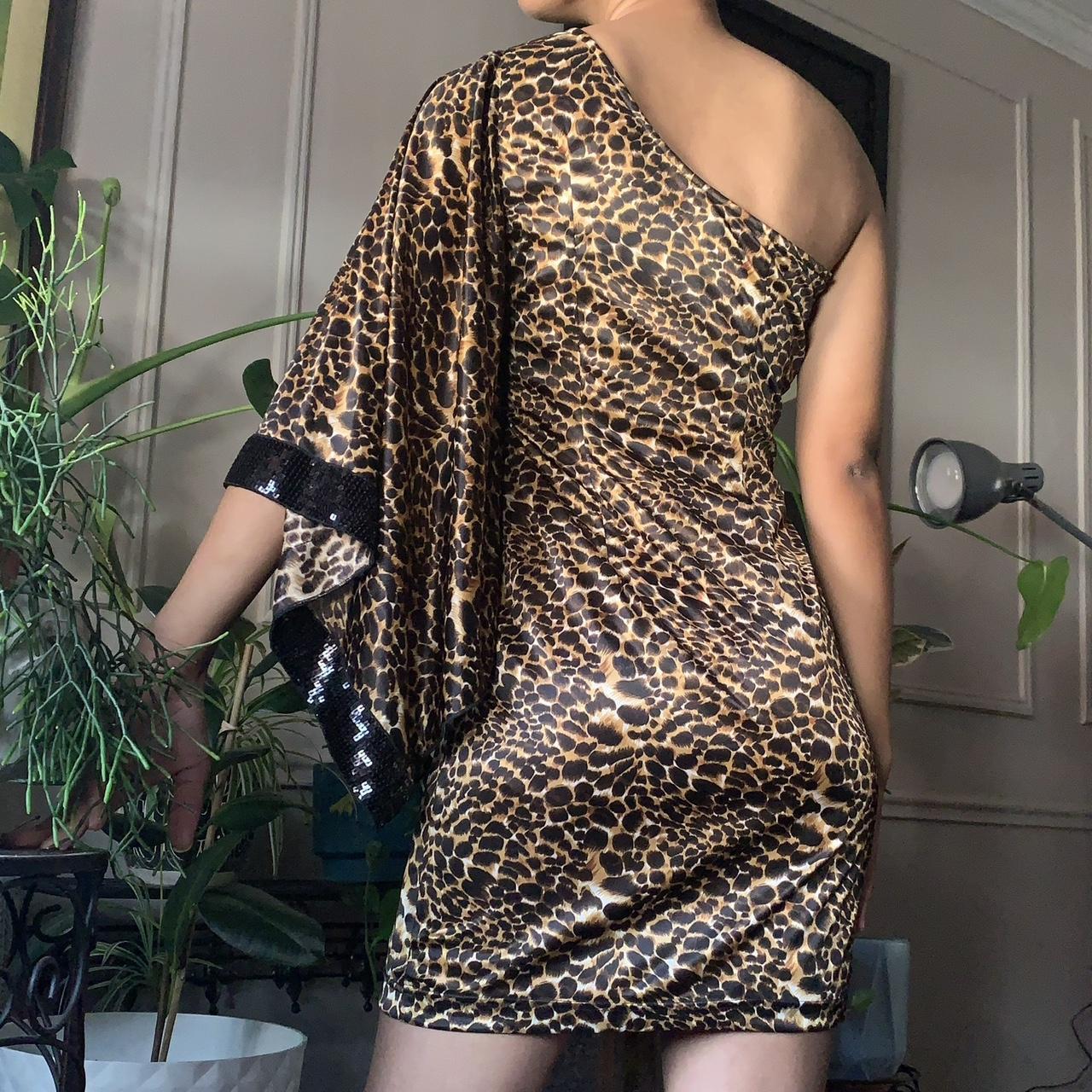 Cheetah print one shoulder sleeve mini dress from Depop