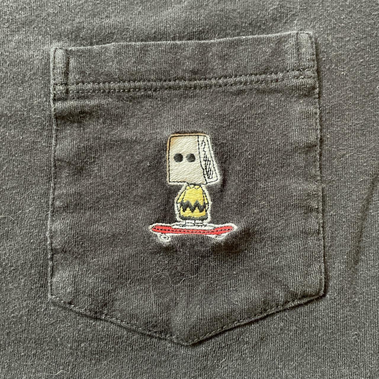 Uniqlo pocket tee x Peanuts Charlie Brown Super... - Depop