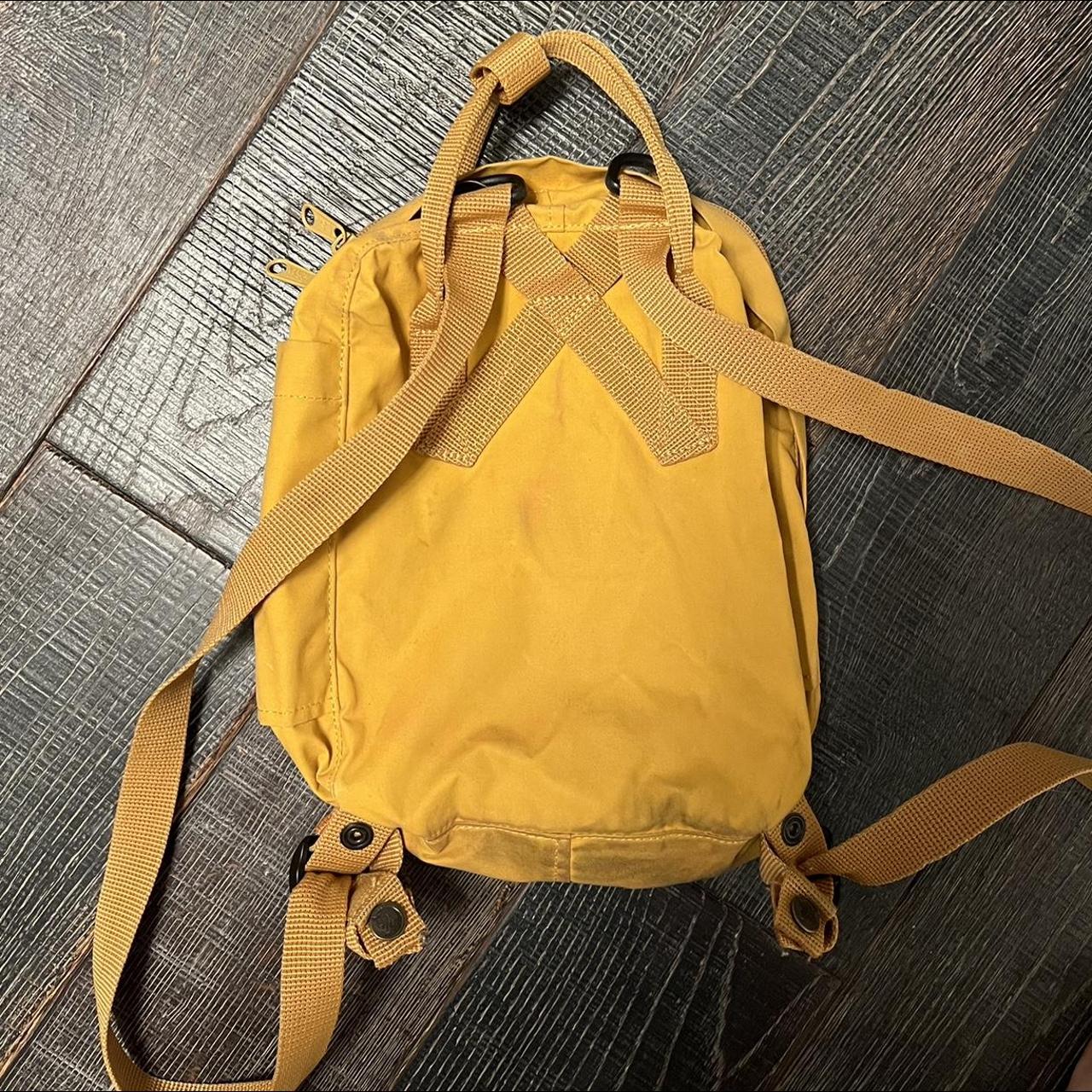 Fjallraven Kånken Mini Backpack in a mustard yellow... Depop