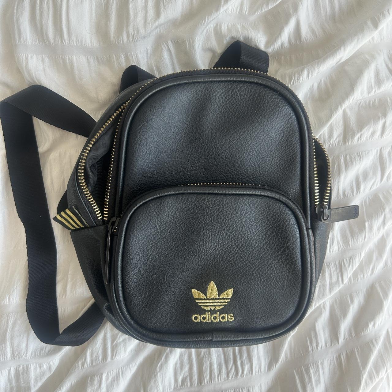 Mini adidas black leather backpack with gold. Depop