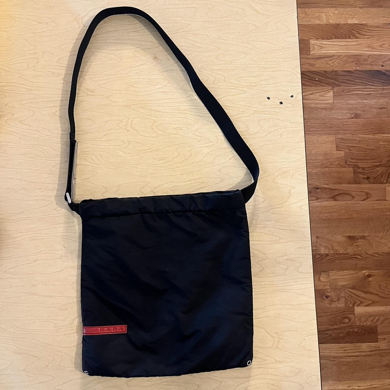 vintage 1999 prada black nylon bag. can be used as a... - Depop