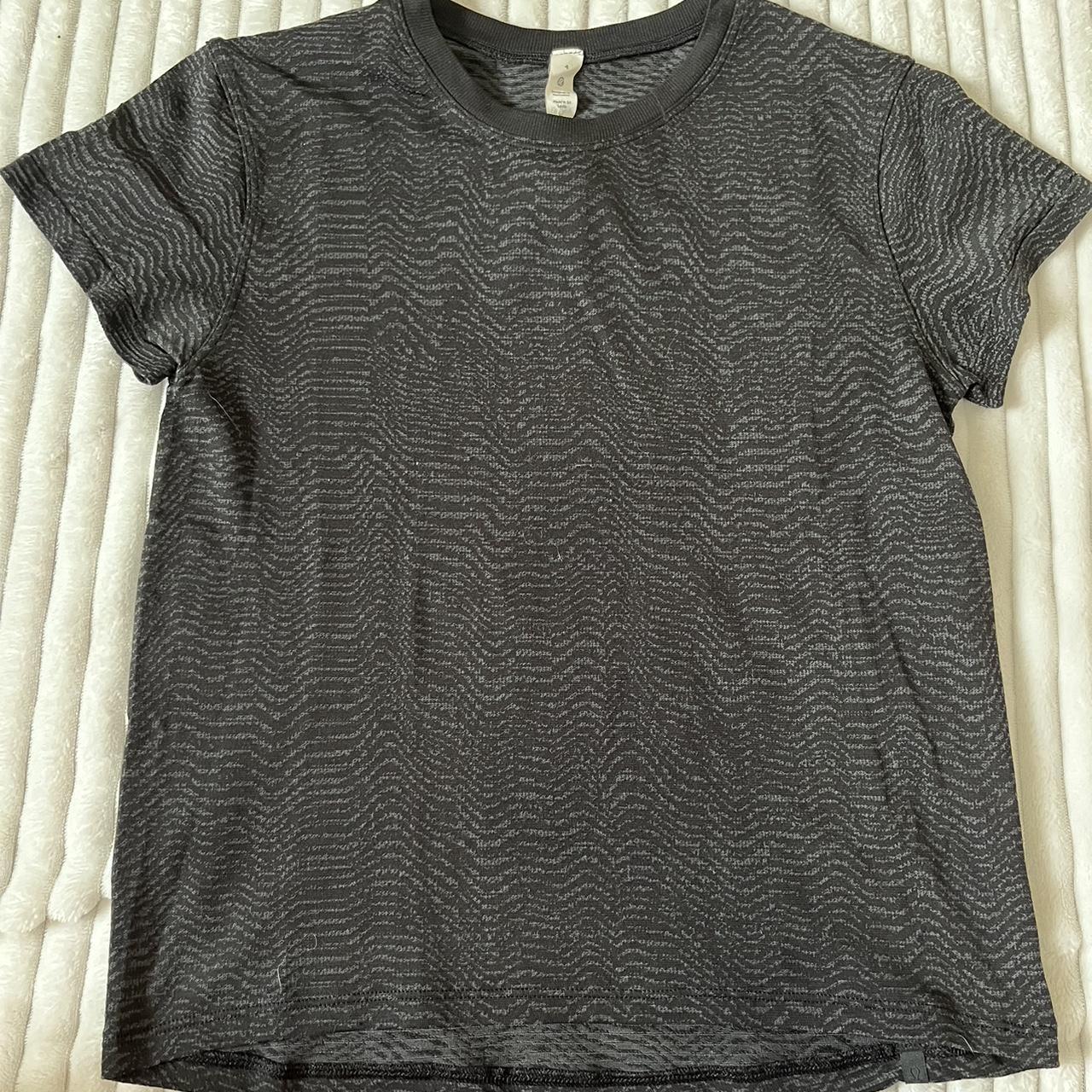 Black patterned Lululemon top. Perfect condition, no... - Depop