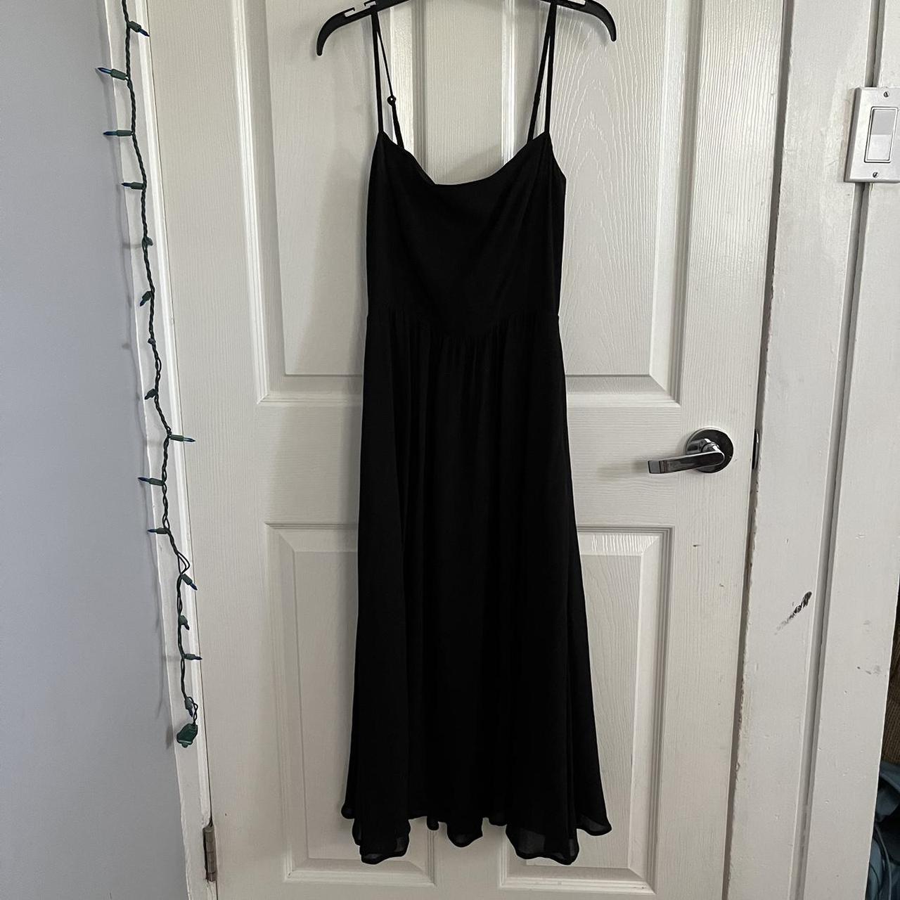 Black reformation dress. Only worn once to... - Depop