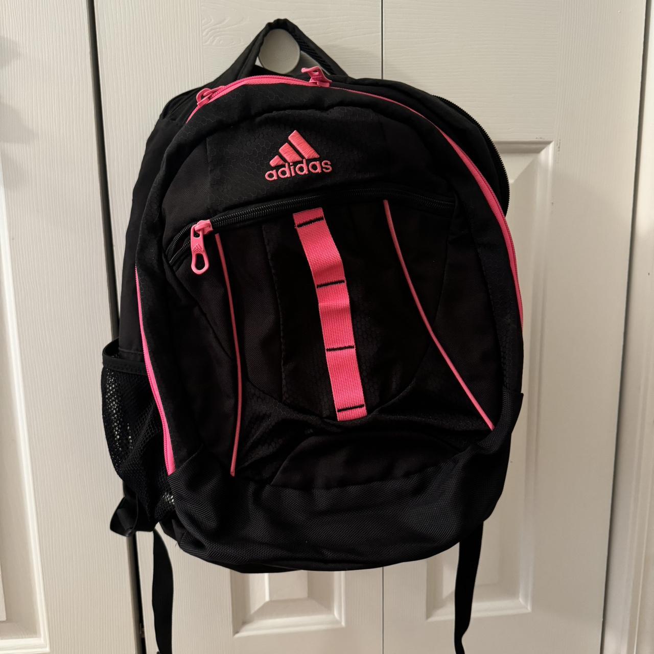 Pink and black adidas load spring straps